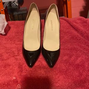 Loslandifen. 5 inch stiletto pumps, red and black size 10.